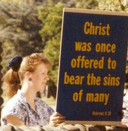 Summer scripture sign holding